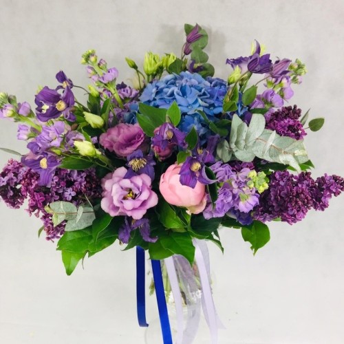 Bridal bouquet with purple flowers